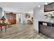 Bright dining area with wood floors and a view to the living room at 714 E Michigan Ave, Deland, FL 32724
