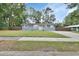 Charming single-story home with a well-maintained lawn and neutral exterior paint at 714 E Michigan Ave, Deland, FL 32724