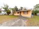 Cute ranch home with a grassy yard at 126 Kensington Ave, Deland, FL 32724