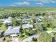 Aerial view of single-Gathering home with pool and lush landscaping at 4430 Doris Dr, New Smyrna Beach, FL 32169