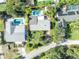 Aerial view of single-Gathering home with pool and backyard at 4430 Doris Dr, New Smyrna Beach, FL 32169