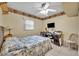Bright bedroom with a comfy bed and home office space at 4430 Doris Dr, New Smyrna Beach, FL 32169