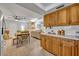 Open kitchen with view into living area, features stainless steel appliances at 4430 Doris Dr, New Smyrna Beach, FL 32169