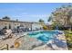 Large kidney shaped pool with a spacious deck and covered patio at 4430 Doris Dr, New Smyrna Beach, FL 32169