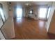 Spacious bedroom with wood floors and sliding glass doors at 507 Dade Ct, Deltona, FL 32725