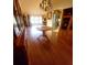 Bright dining area with hardwood floors and wooden table at 507 Dade Ct, Deltona, FL 32725