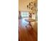 Dining room with hardwood floors and a chandelier at 507 Dade Ct, Deltona, FL 32725