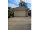 Attached 1-car garage with brick exterior at 507 Dade Ct, Deltona, FL 32725