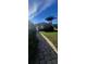 Brick guest house with a walkway and grassy yard at 507 Dade Ct, Deltona, FL 32725