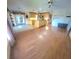 Open kitchen with wood cabinets and an island at 507 Dade Ct, Deltona, FL 32725