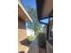 Brick walkway leads to detached garage and backyard at 507 Dade Ct, Deltona, FL 32725