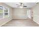 Dining room with hardwood floors and a view into the kitchen at 1720 Needle Palm Dr, Edgewater, FL 32132