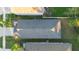 Aerial view revealing the house's roofline and surrounding landscape at 2924 Taton Trce, New Smyrna Beach, FL 32168