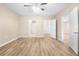 Spacious bedroom with wood-look floors and ample closet space at 2924 Taton Trce, New Smyrna Beach, FL 32168
