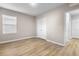 Spacious bedroom with light walls and wood-look flooring at 2924 Taton Trce, New Smyrna Beach, FL 32168