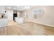 Combined dining and kitchen area with vinyl flooring and island at 2924 Taton Trce, New Smyrna Beach, FL 32168