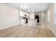 Modern kitchen with white cabinets, breakfast bar, and black appliances at 2924 Taton Trce, New Smyrna Beach, FL 32168