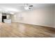Open living room and kitchen area with vinyl flooring throughout at 2924 Taton Trce, New Smyrna Beach, FL 32168