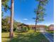 Single-story house with a large yard and driveway at 4851 Orange Ave, Port Orange, FL 32127