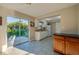Kitchen with wood cabinets and granite countertops at 4851 Orange Ave, Port Orange, FL 32127