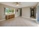Living room with tile floors and access to other rooms at 4851 Orange Ave, Port Orange, FL 32127