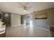 Spacious living room with tile floors and neutral colors at 4851 Orange Ave, Port Orange, FL 32127