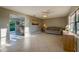 Bright living room with tile floors and a view of the kitchen at 4851 Orange Ave, Port Orange, FL 32127