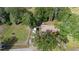 Expansive property featuring a residence and RV amid lush greenery, enhanced by mature trees and open spaces at 1195 Glen Royal Ter, Deland, FL 32720