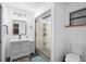 Modern bathroom with shiplap walls, glass-enclosed shower, and sleek vanity at 1195 Glen Royal Ter, Deland, FL 32720