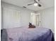 Cozy bedroom features built-in closet and a ceiling fan at 1437 Colin Kelly Ave, Daytona Beach, FL 32124