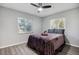 Comfortable bedroom with natural light and wood-look flooring at 1437 Colin Kelly Ave, Daytona Beach, FL 32124
