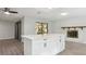 Bright kitchen featuring a center island, white cabinets, and modern finishes at 1437 Colin Kelly Ave, Daytona Beach, FL 32124