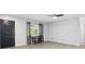 Living room boasts an open entry, lots of natural light, and stylish, neutral-toned flooring at 1437 Colin Kelly Ave, Daytona Beach, FL 32124