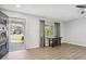 Living room boasts an open entry, lots of natural light, and stylish, neutral-toned flooring at 1437 Colin Kelly Ave, Daytona Beach, FL 32124