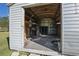 Interior view of shed with open storage and shelves at 1437 Colin Kelly Ave, Daytona Beach, FL 32124