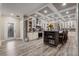 Gourmet kitchen featuring a large island, stainless steel appliances, and custom cabinetry at 227 N Putnam Grove Rd, Oak Hill, FL 32759