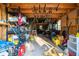 Spacious storage shed with pegboard and wall mounted storage solutions for fishing gear at 227 N Putnam Grove Rd, Oak Hill, FL 32759