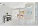Bright entryway featuring soaring ceilings, a transom window, and decorative front door with sidelights at 3190 Lori Ct, Deltona, FL 32738