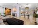 Open concept living room with tile floors and access to the kitchen and dining areas at 1083 E Normandy Blvd, Deltona, FL 32725