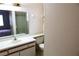 Clean bathroom with a single sink vanity, toilet and shower at 1201 Buccaneer Ave, Deltona, FL 32725