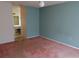 Bedroom with pink carpet and light blue walls at 1201 Buccaneer Ave, Deltona, FL 32725