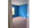 Simple bedroom with carpet flooring and a window at 1201 Buccaneer Ave, Deltona, FL 32725