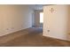 Spacious living room with carpeted floors and neutral walls at 1201 Buccaneer Ave, Deltona, FL 32725