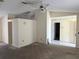 Living room with carpeted floors and neutral-colored walls at 1201 Buccaneer Ave, Deltona, FL 32725