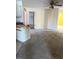 Large living room with carpeted floors and neutral walls at 1201 Buccaneer Ave, Deltona, FL 32725