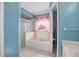 Bathroom with a bathtub and shower at 1267 Saxon Blvd, Deltona, FL 32725