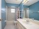 Bathroom with a vanity, toilet and bathtub at 1267 Saxon Blvd, Deltona, FL 32725