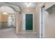 Bright and spacious entryway with tiled flooring and arched details at 1267 Saxon Blvd, Deltona, FL 32725