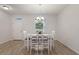 Bright dining area with plenty of natural light and hardwood floors at 1600 Lady Fern Trl, Deland, FL 32720