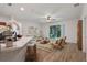 Bright living room with sliding glass doors leading to backyard at 1600 Lady Fern Trl, Deland, FL 32720